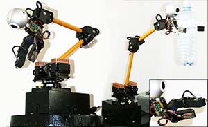 robotic arm with three touch sensors, one slip sensor, a camera and a microphone